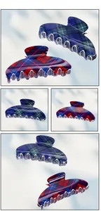 Close-up of large plaid hair claw clips in blue and red tartan patterns with glossy finish