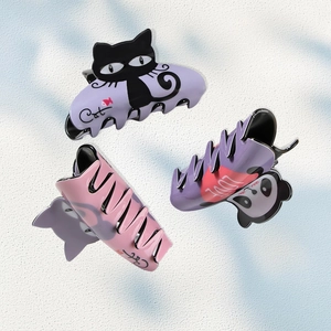 Cute cat and panda PVC hair claws for girls in various pastel purple and pink colors