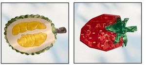 Detail view of acetate fruit hair claws featuring durian and strawberry designs