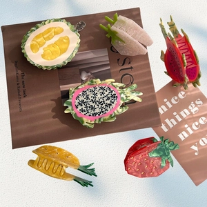 Creative fruit acetate hair claws including dragon fruit and pineapple designs