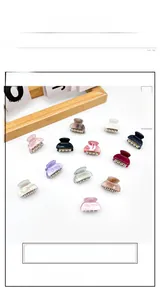 Set of 12 colorful mini acrylic hair claws with marble texture and gold metal springs