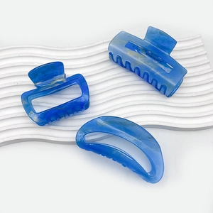 Modern starry blue marble acrylic hair claw set with rectangular and crescent shapes