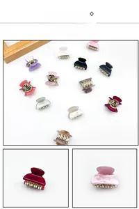 Detailed macro view showing diverse colors and textures of mini acrylic hair claws