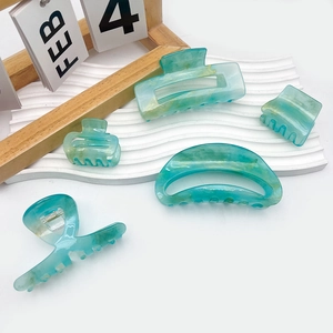 Green acrylic marble hair claw clips set in various shapes for women styling