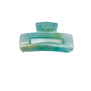 Elegant semi-transparent green marble hair claw clip with golden patterns for women