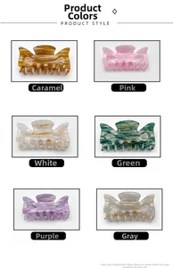 Detail showing marble texture butterfly bow hair claws in six various colors
