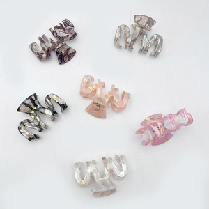 Set of 6 colorful geometric hair claws with marble textures and pearlescent finish