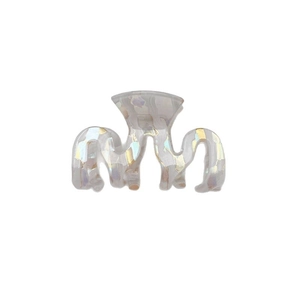 Elegant geometric M-shaped hair claw clip in translucent grey resin with colorful glitters