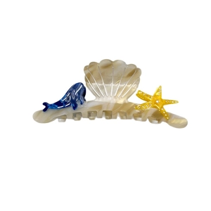 Marine acetate claw clip featuring blue whale, starfish, and scallop seashell designs