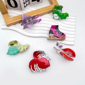 Funny Halloween hair claws set featuring caterpillar heart and butterfly shapes