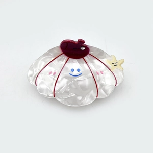 Cartoon shell acetate hair claw clip with starfish and blue smiley face pattern