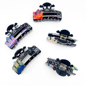 Halloween skull hair claw clips with haunted castle prints and rhinestones in various angles