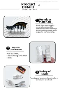 Detailed view of musical piano hair claw clip with black and white keys and metal spring