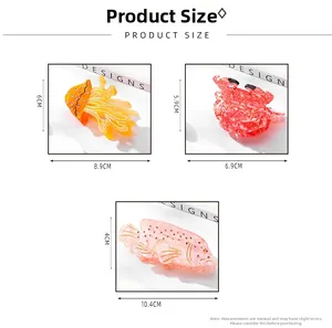 Size chart for ocean-themed acetate hair clips featuring jellyfish, crab, and fish shapes