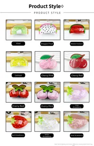 Macro view showing a grid of colorful acrylic fruit hair claws including watermelon and cherry