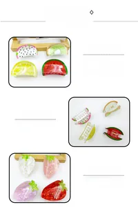 Detailed close-up of colorful acetate fruit hair claws featuring watermelon and strawberry