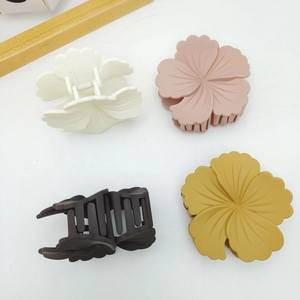 Floral matte plastic hair claw clips in four colors for elegant hair styling