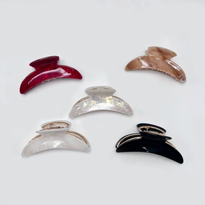 Set of five colorful crescent acrylic hair claws with golden metal springs for thick hair