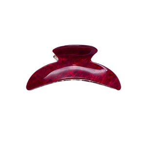 Deep wine red crescent acrylic hair claw with marble texture and gold base finish