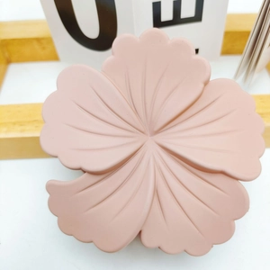 Matte pink hibiscus flower hair claw clip with frosted resin texture for women