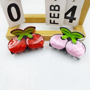 Creative cherry fruit hair claws in red and pink colors with pearlescent resin finish