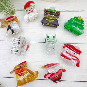 Weihnachts-Haarklammer-Set mit Weihnachtsmann- und Schneemann-Motiven in Festfarben