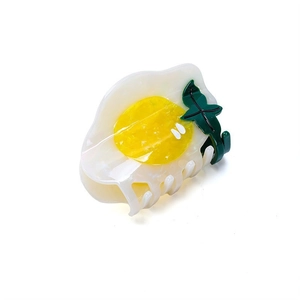 Creative fried egg acetate hair claw clip with green leaf detail for women