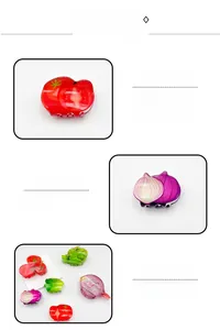Vue détaillée de pinces à cheveux en acrylique en forme de tomates et poivrons