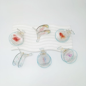 Set di 6 mollette per capelli in acrilico trasparente con stampe di granchi e meduse