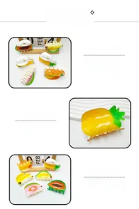 Detail showing tropical fruit claw clips with pineapple and papaya designs