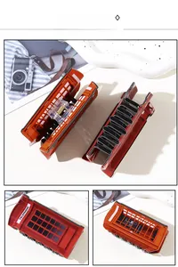 Detail view of the vintage red telephone booth hair claw clip made of acrylic