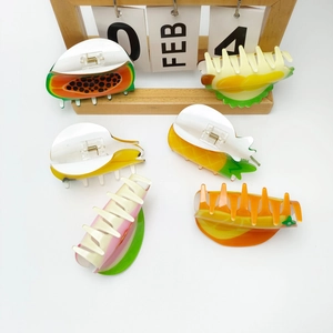 5-piece set of large acrylic fruit hair claws featuring pineapple and papaya fruit designs