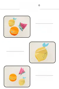 Detailed macro view showing colorful acrylic fruit hair claws in lemon and watermelon designs