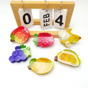 Colorful fruit shaped hair claws with marble texture in various fruit designs