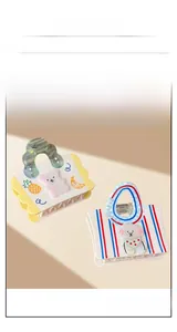 Detail of cartoon bear and puppy hair clips with colorful acetate patterns and textures