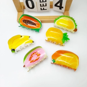 Chic acrylic fruit hair claws featuring pineapple and banana designs for women