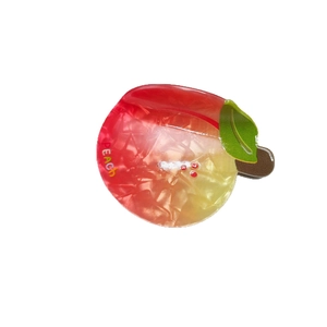 Cute peach-shaped hair claw clip with red-yellow marble texture and green leaf detail