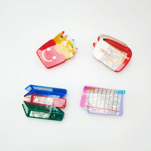 Cute school supply theme hair clips set with pencil and notebook designs for women
