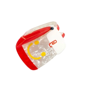 School style white marble hair claw clip with yellow smiley face and red paperclip pattern