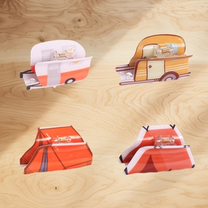 Cute camping themed acrylic hair claw clips featuring tent and vintage RV trailer designs