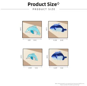 Size chart showing dimensions of blue whale and dolphin hair claw clips for women