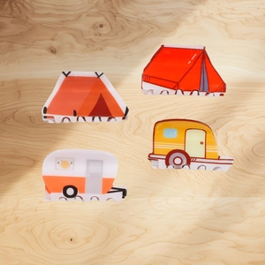 Creative camping hair claws set featuring acrylic tent and caravan shapes on wood