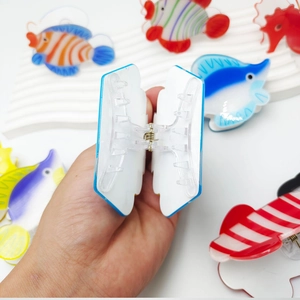 Cute acrylic clownfish hair claw clip with colorful patterns and strong metal spring