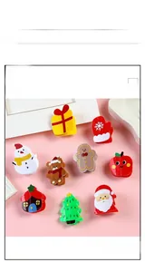 Detailed set of acrylic Christmas hair claws featuring Santa, snowman, and reindeer shapes