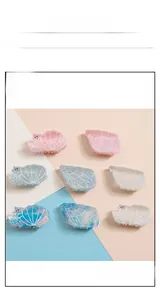 Collection of Korean seashell hair claw clips in soft pastel colors with subtle glitter finish