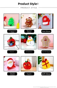 Collection of nine festive Christmas hair clips including Santa, trees, and snowmen