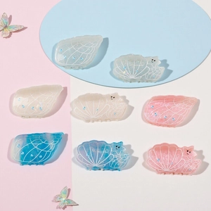 Ethereal ocean shell hair claw clips with iridescent glitter and small blue rhinestones