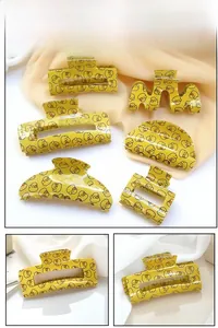 Ensemble détaillé de six pinces à cheveux jaunes avec motifs de canard en acétate