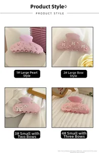 Detailansicht von Haarklammern aus Acetat mit Perlen und weißen Schleifen in Rosa