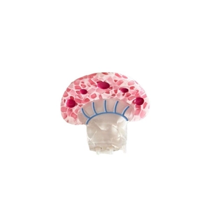 Cute mushroom-shaped acetate hair claw clip with pink stone texture and pearl white stem